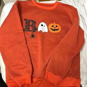 Orange Halloween sweatshirt.